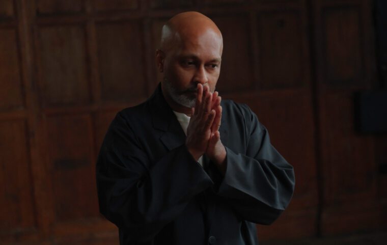 Dance Umbrella 26 A portrait of Akram Khan in pensie mood, with hands together in front of his chest