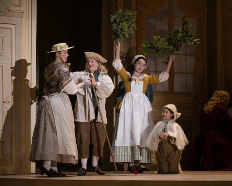 Barbarina (Biqing Zhang), Child (Olivia Cowles) and members of the Glyndebourne Chorus. The Marriage of Figaro, Glyndebourne Autumn Season 2026