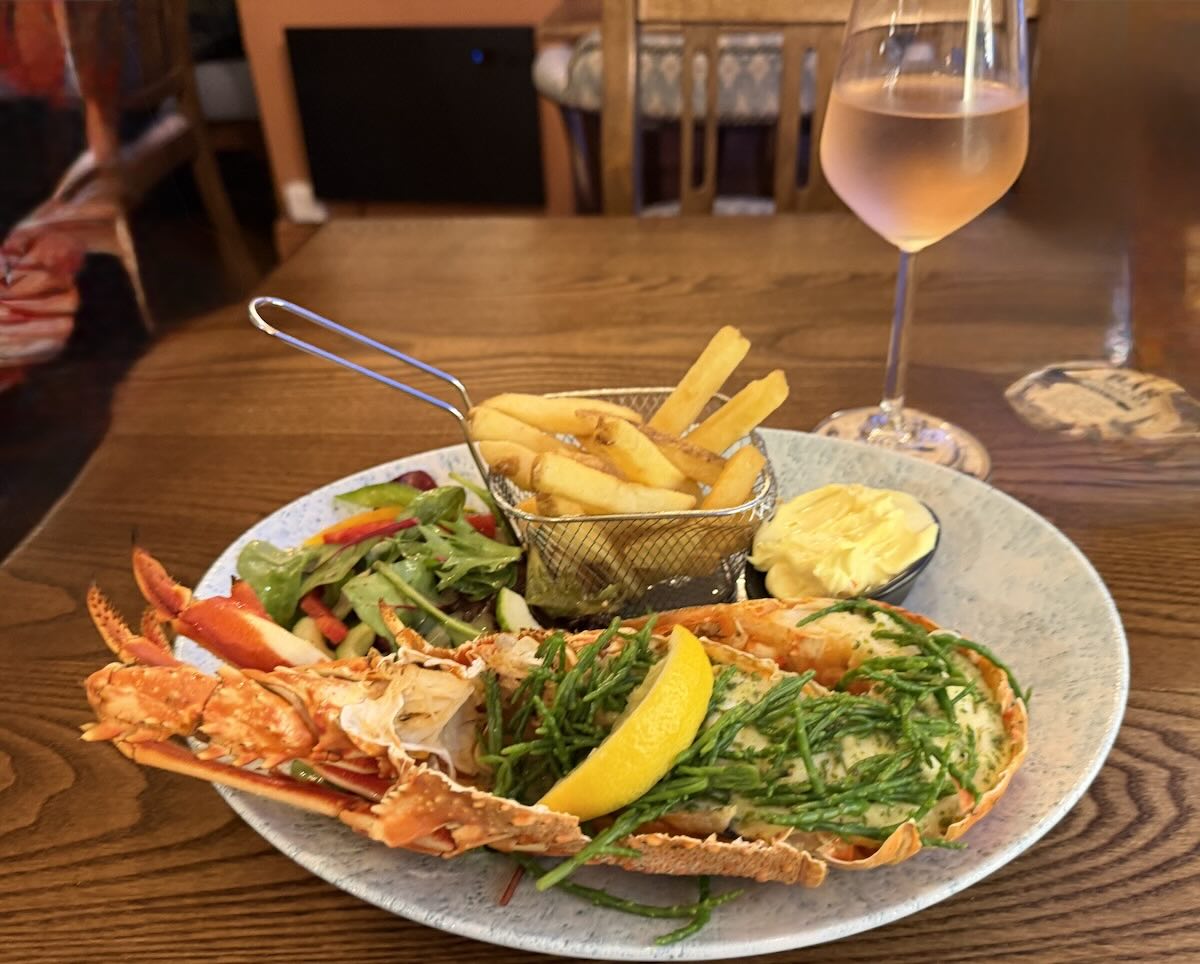 Crawfish with fries and salad at the Bishop & Wolf pub